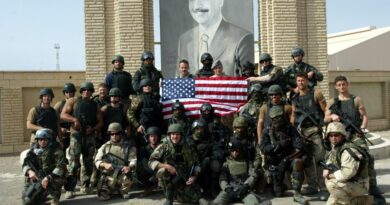 POLISH SPECIAL FORCES STAND IN THE PORT OF UMM-QASR IN SOUTHERN IRAQ